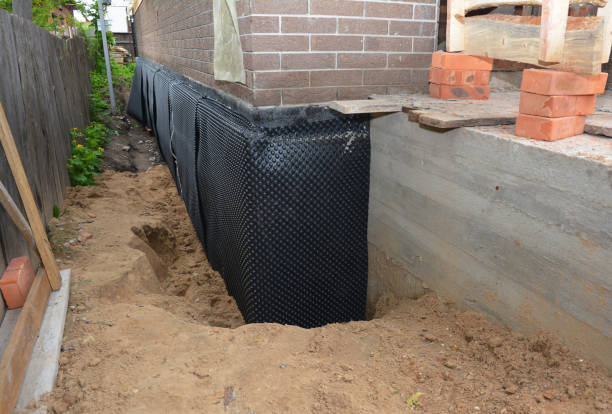 SJ Waterproofing Pros technician performing targeted Interior Drainage System assessment in Salem, NJ